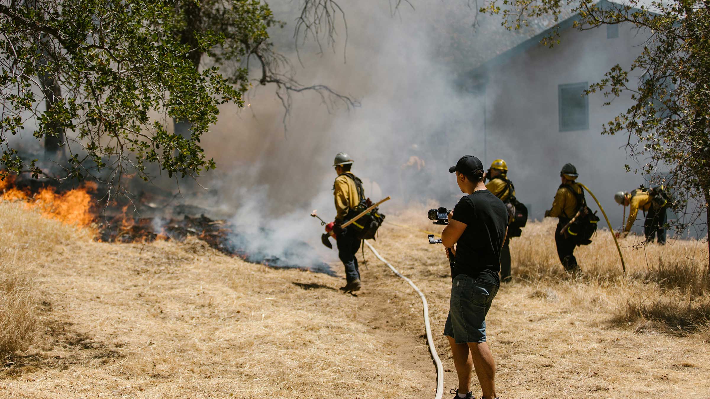 firefighters battle a fire