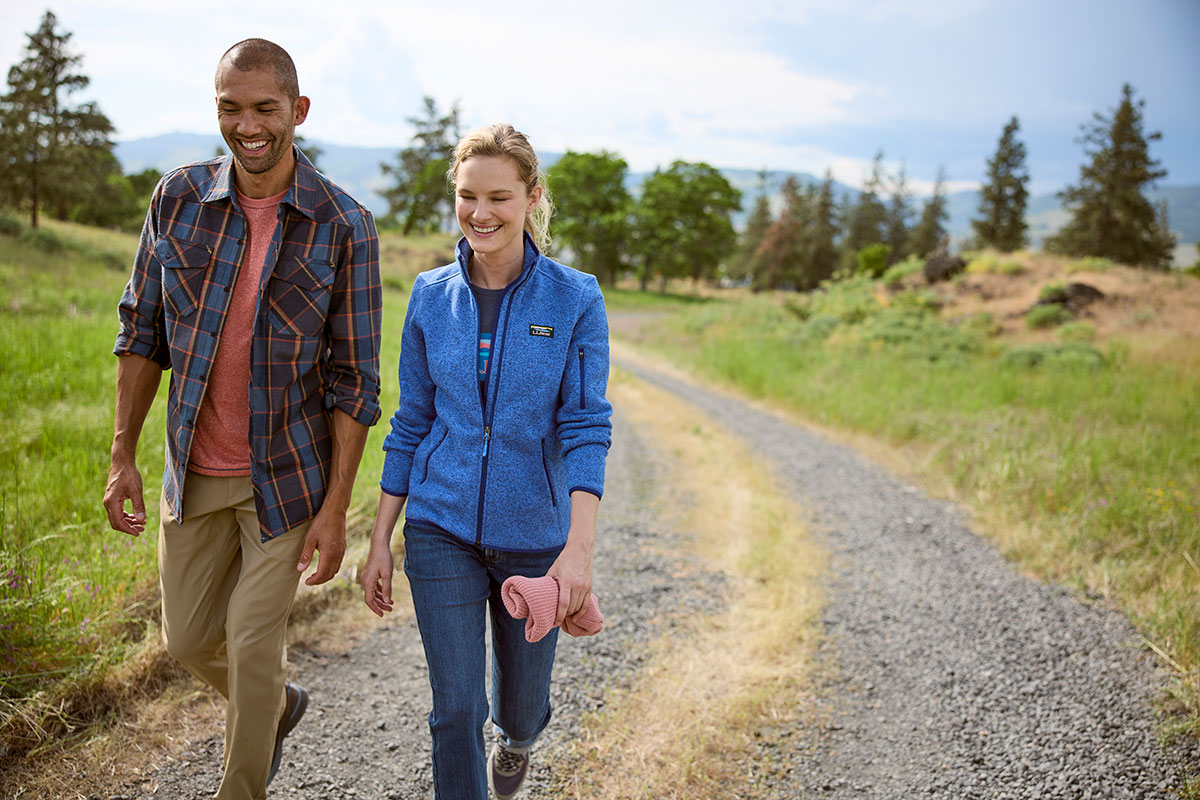 two people walking outside