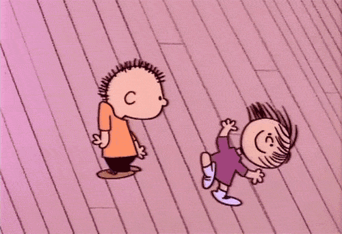 Peanuts characters dance on wooden floor