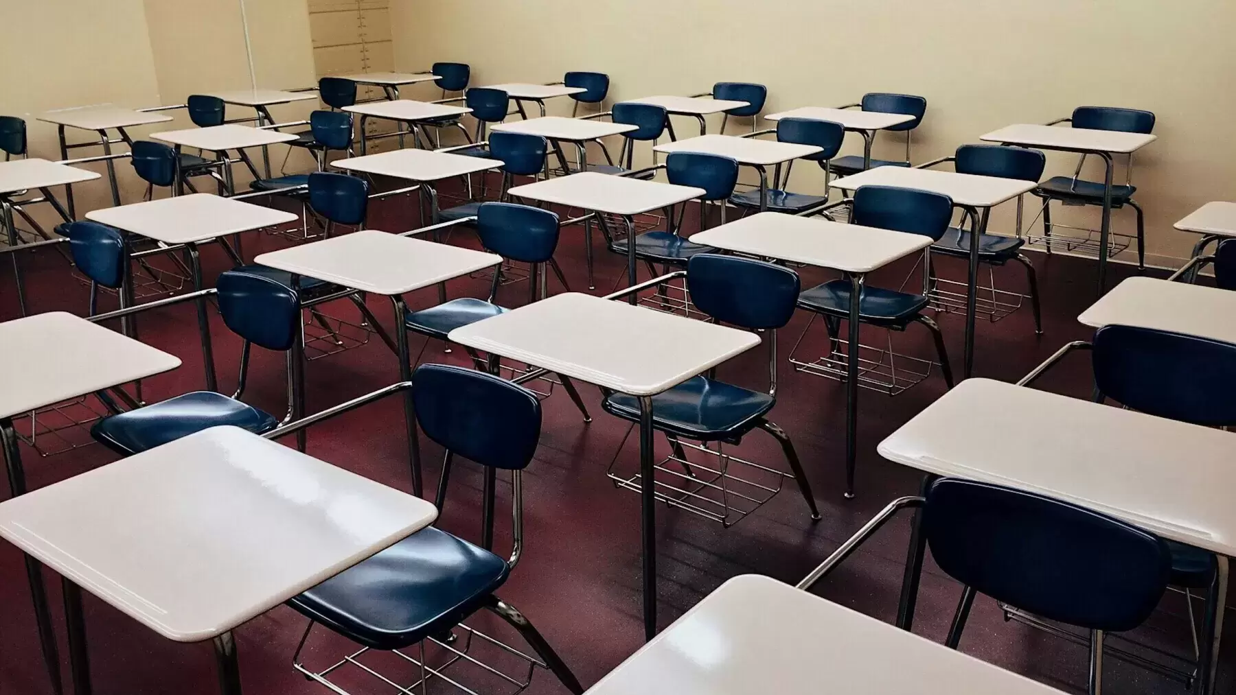 classroom full of empty desks