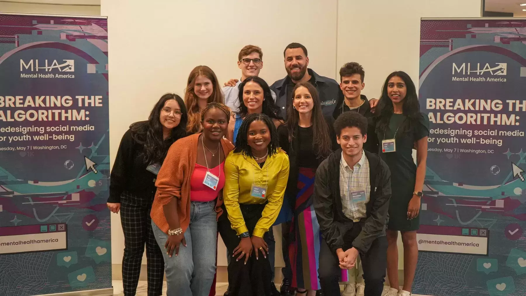 Group of youth and youth advocates stand together at Breaking the Algorithm conference