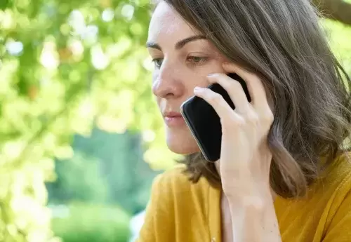 person talking on phone