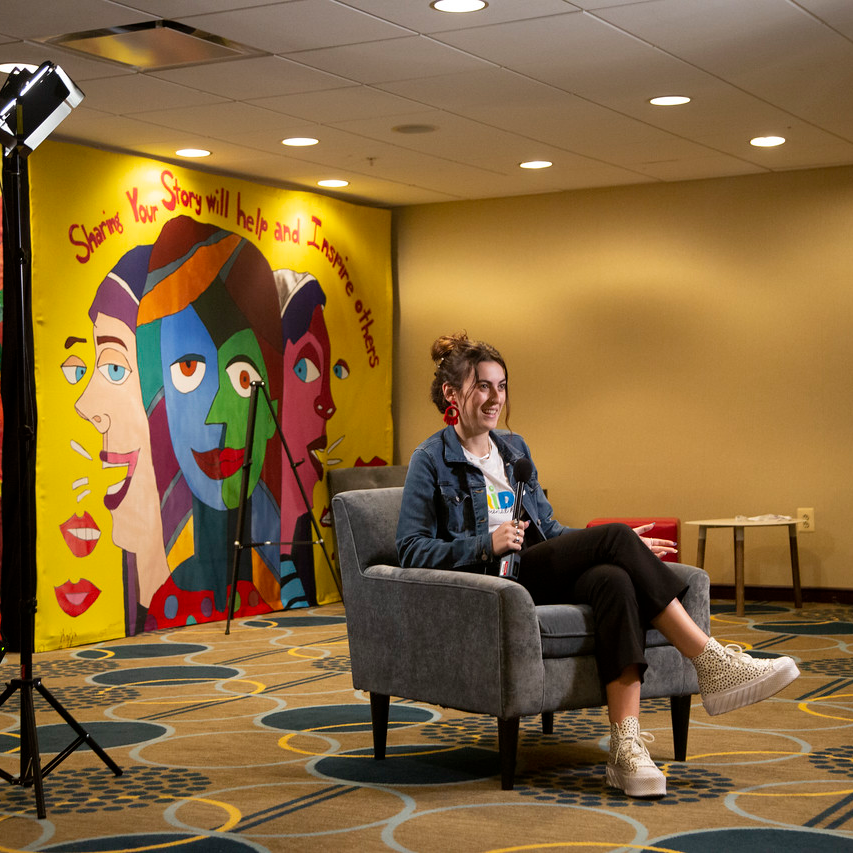 Sydney Daniello conducts interviews at the 2022 Mental Health America Conference